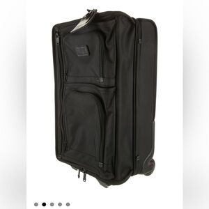 Tumi Black Luggage Travel Bag with Wheels